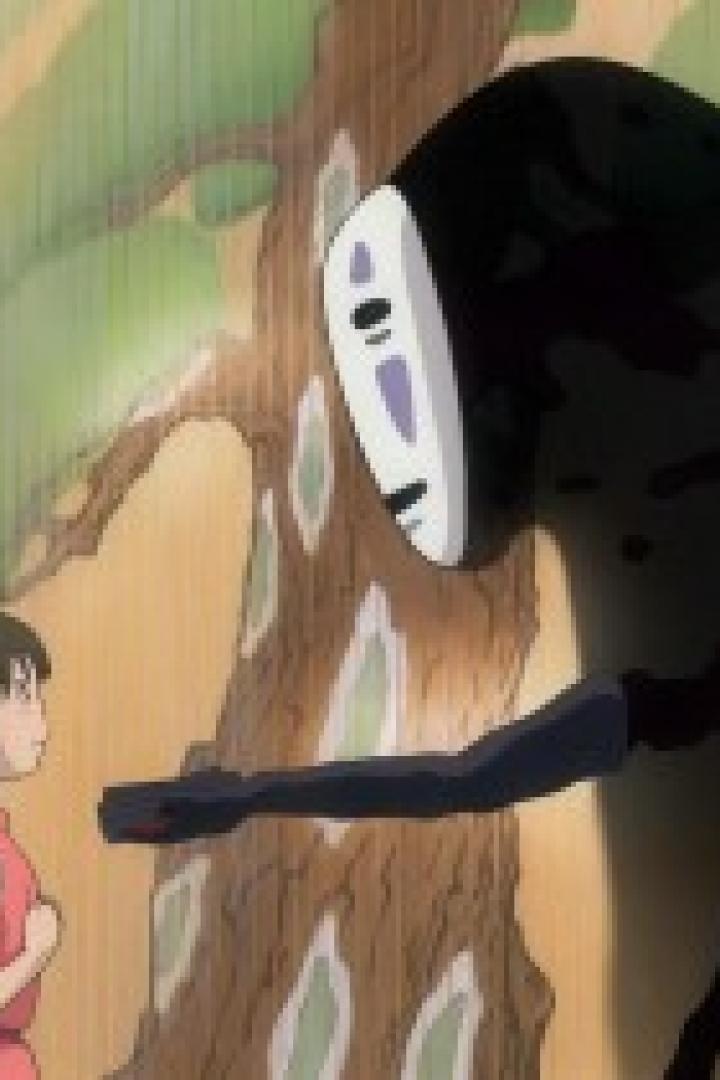 Chihiro steht im Regen vor No-Face in einer Szene aus „Chihiros Reise ins Zauberland“.
