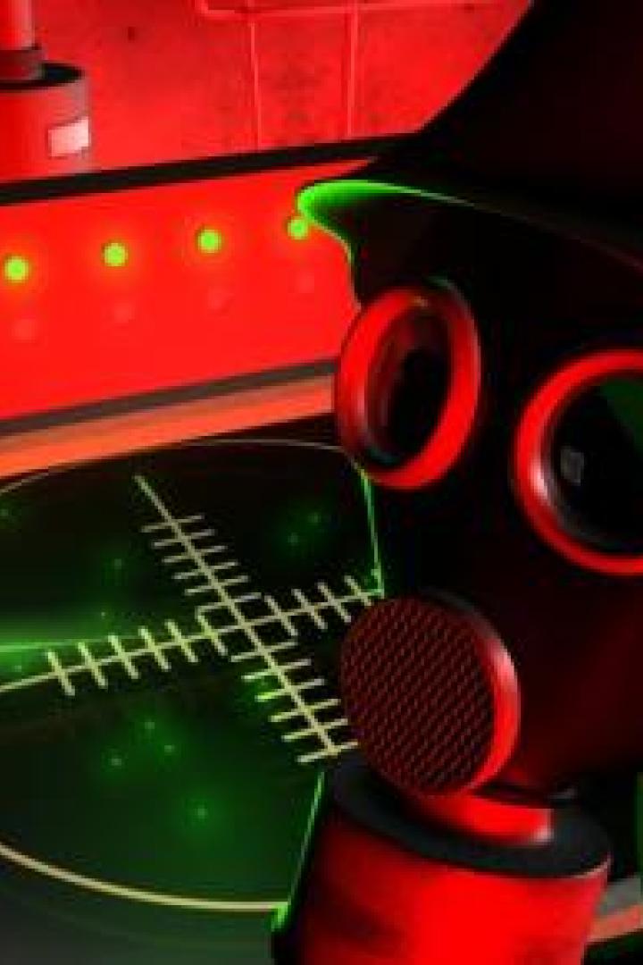 Eine Person mit Gasmaske steht vor einer Konsole mit einem Radarschirm.