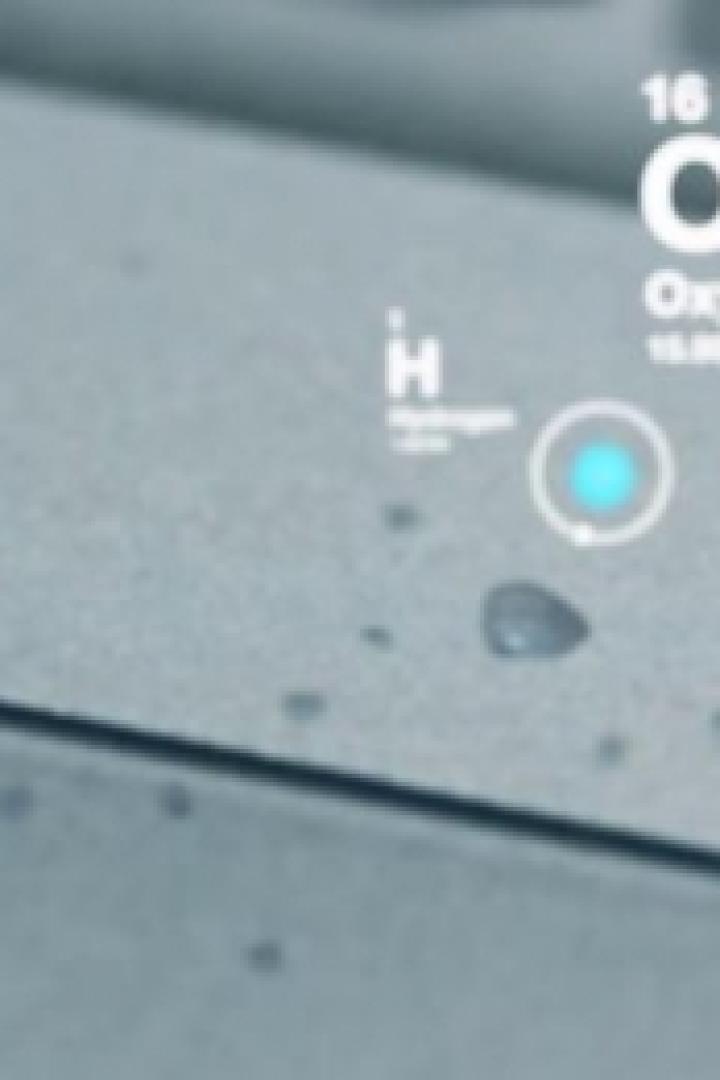 Visualisierung von Wasserstoff- und Sauerstoffatomen auf einer Oberfläche.