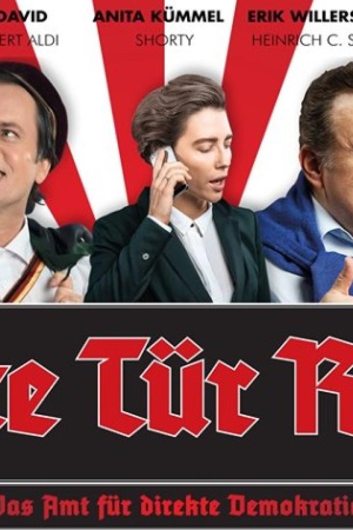 Das Ensemble von „Zweite Tür Rechts – Das Amt für direkte Demokratie“ posiert für ein Gruppenbild.