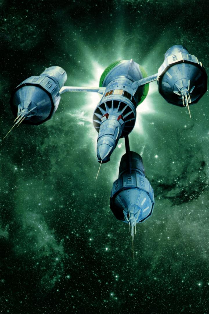 Ein blaues Raumschiff fliegt vor einem grünen Sternenhintergrund.