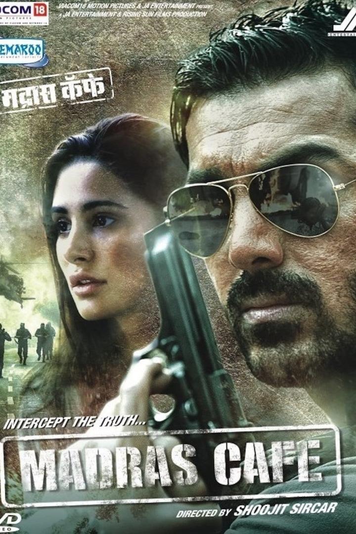 Das Filmplakat für „Madras Cafe“ zeigt einen Mann mit Sonnenbrille und eine Frau mit einer Pistole in der Hand.