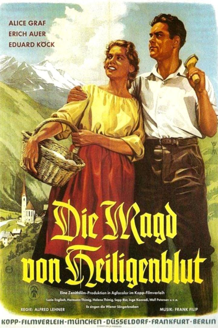 Das Filmplakat für „Die Magd von Heiligenblut“ zeigt Alice Graf und Erich Auer in Tracht vor einer Bergkulisse.