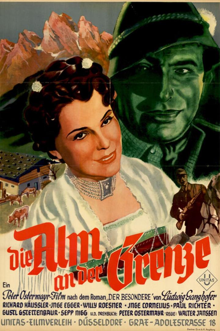 Das Filmplakat für „Die Alm an der Grenze“ zeigt eine Frau, einen Mann mit Hut und eine Berglandschaft.