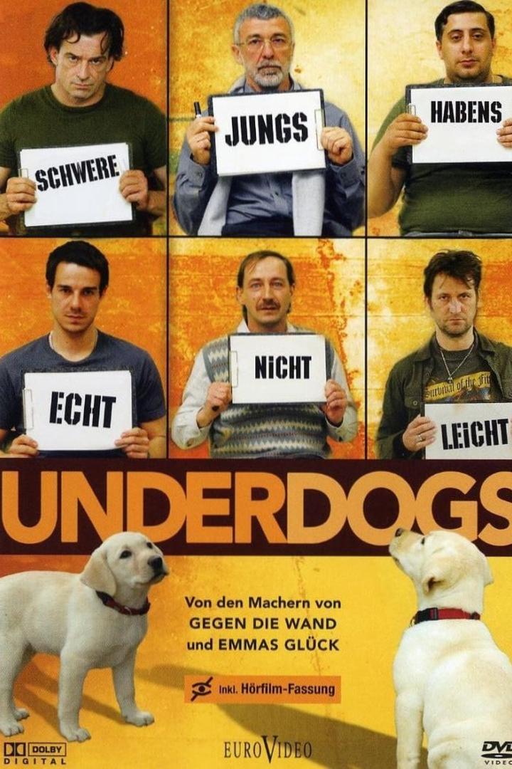 Das Cover des Films „Underdogs“ zeigt sechs Männer mit Schildern und zwei Labradorwelpen.