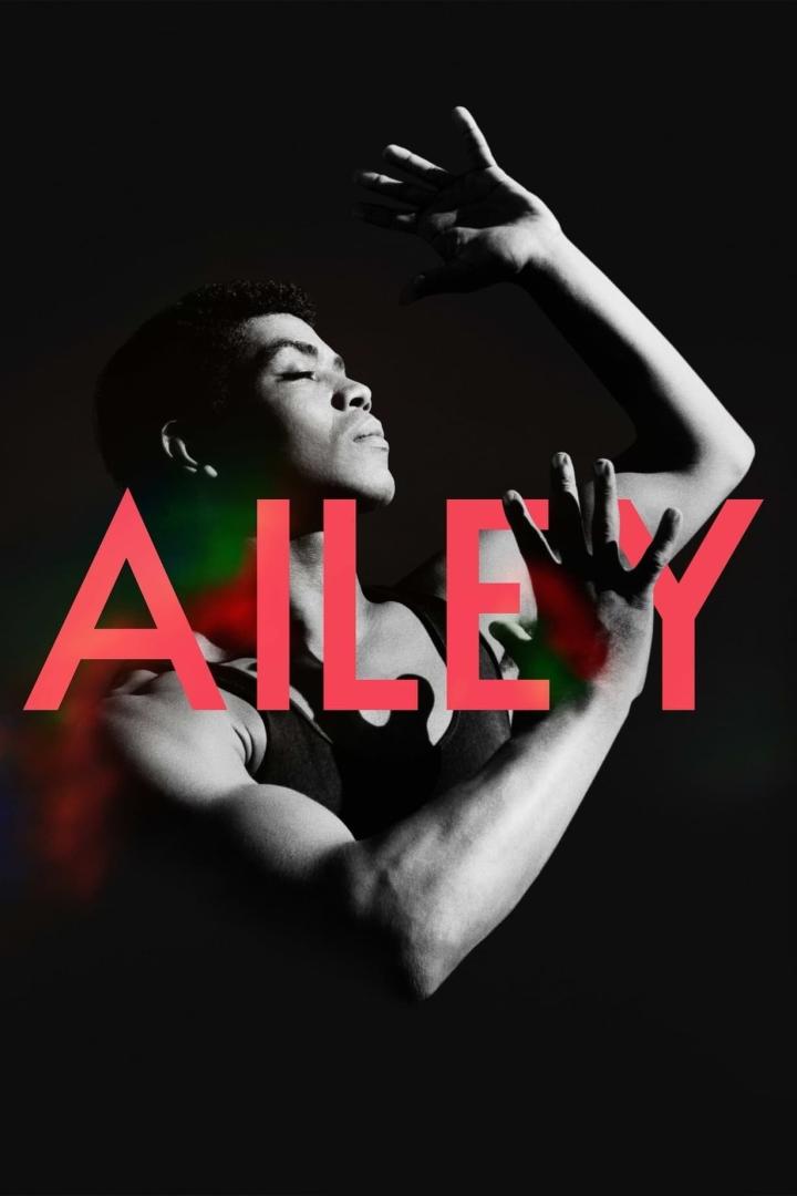 Ein Tänzer posiert vor dem Schriftzug „Ailey“.