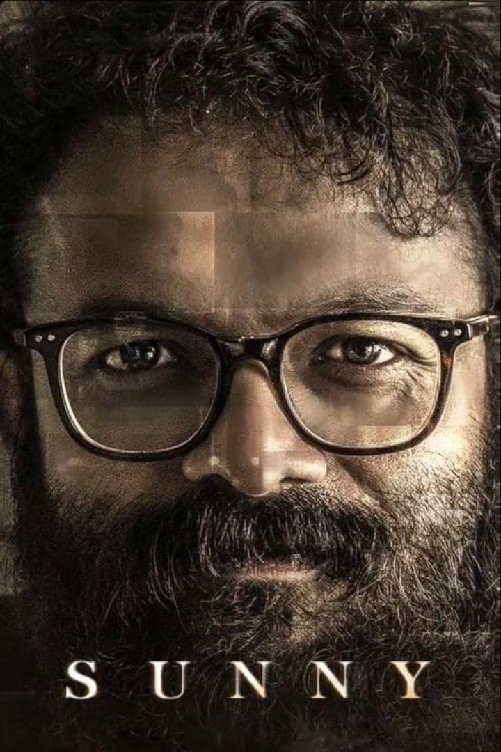 Ein Porträt des Schauspielers Jayasurya mit Brille, beworben für den Film „Sunny“.