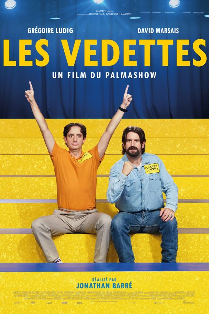 Das Filmplakat für „Les Vedettes“ mit Grégoire Ludig und David Marsais auf gelben Stufen.