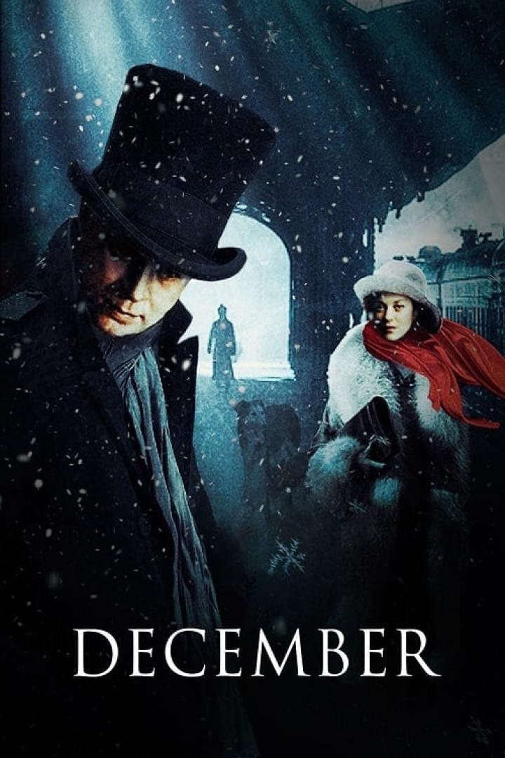 Ein Mann mit Zylinder und eine Frau mit rotem Schal im verschneiten Dezember.