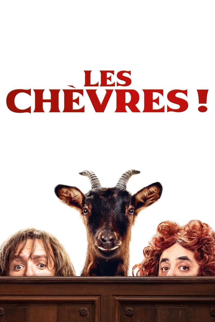 Das Filmplakat für „Les Chèvres!“ zeigt eine Ziege zwischen zwei Menschen, die über eine Holzwand schauen.