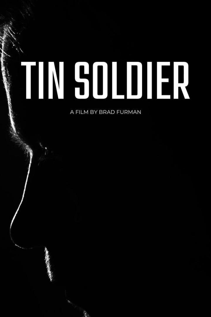 Das Filmplakat für „Tin Soldier“ zeigt das Profil eines Mannes im Schatten.
