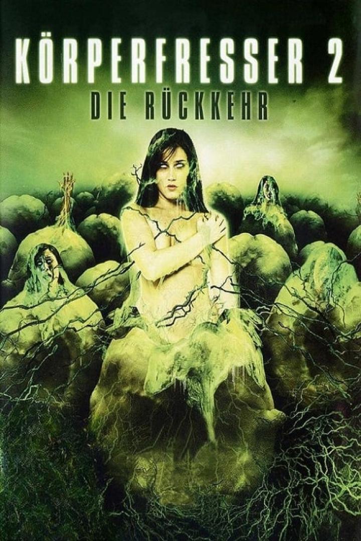 Das Filmplakat für „Körperfresser 2 – Die Rückkehr“ zeigt eine Frau inmitten von grünen, schleimigen Kokons.