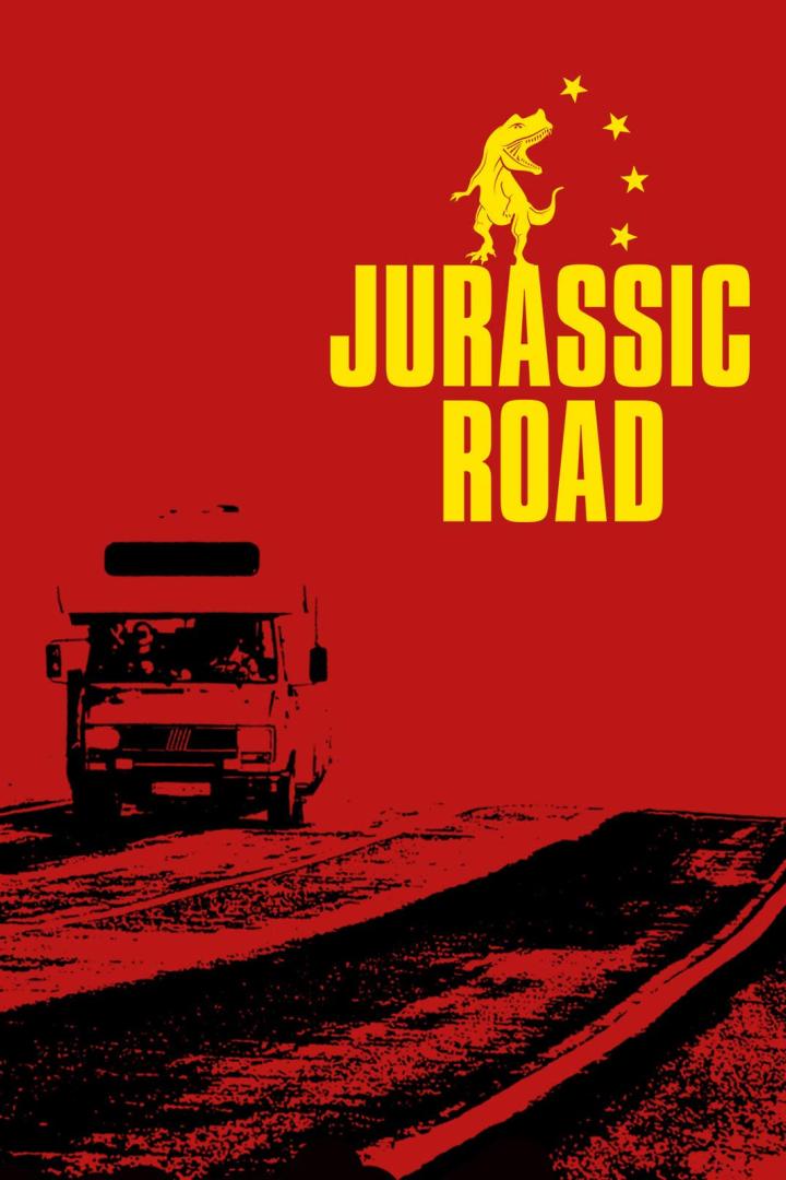 Ein Wohnmobil fährt auf einer Straße unter dem gelben Schriftzug „Jurassic Road“ und einem Dinosaurier mit Sternen.