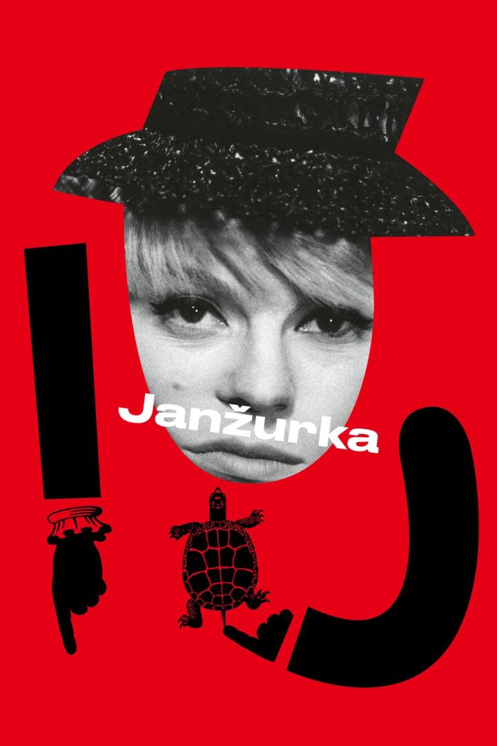 Ein rotes Plakat mit dem Gesicht einer Frau, einer Schildkröte und dem Namen Janžurka.