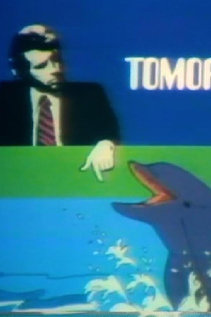 Ein Mann im Anzug zeigt auf einen Cartoon-Delfin unter dem Wort „TOMORROW“.