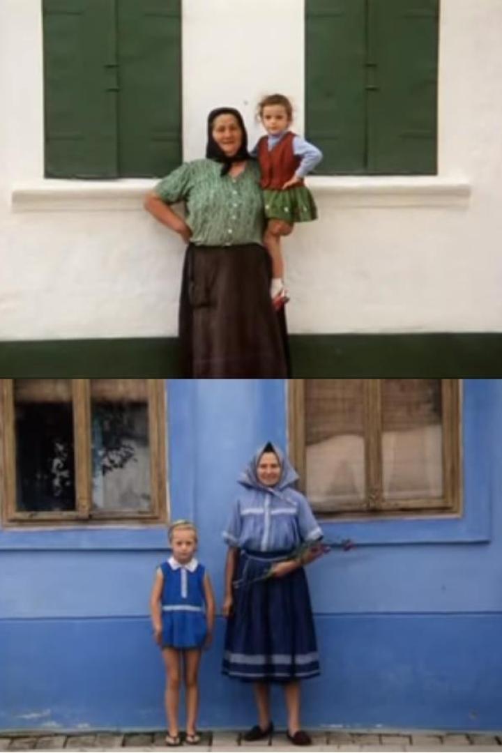 Zwei Frauen und zwei Mädchen in traditioneller Kleidung vor Häusern.