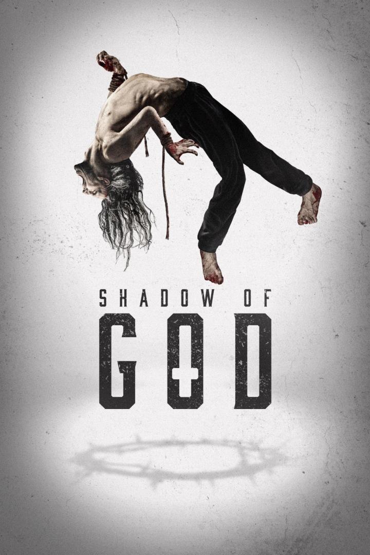 Ein Mann hängt kopfüber an einem Seil, Titel des Bildes ist „Shadow of God“.