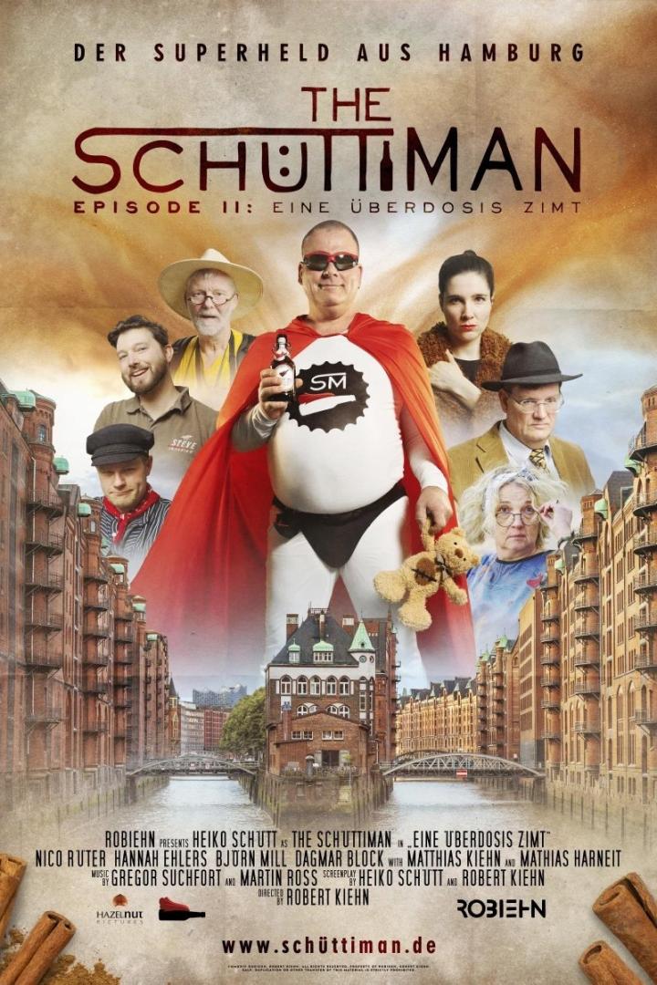Das Filmplakat für „The Schüttiman: Episode II – Eine Überdosis Zimt“ zeigt den Superhelden und weitere Charaktere vor Hamburger Kulisse.
