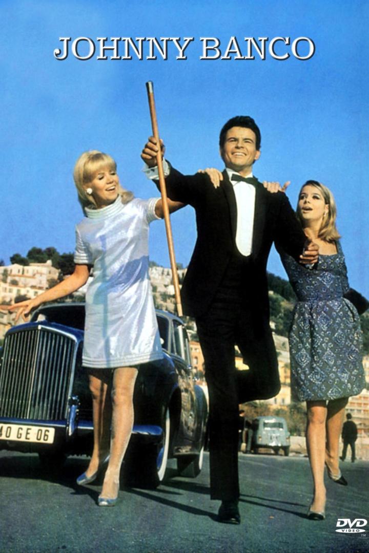 Das Filmplakat für „Johnny Banco“ zeigt einen Mann mit zwei Frauen und einem Auto.