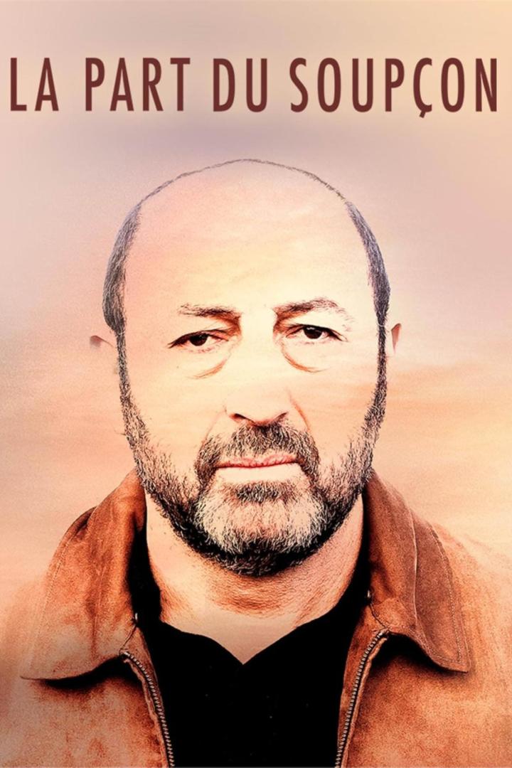 Das Filmplakat für „La Part du Soupçon“ zeigt das Porträt eines Mannes.