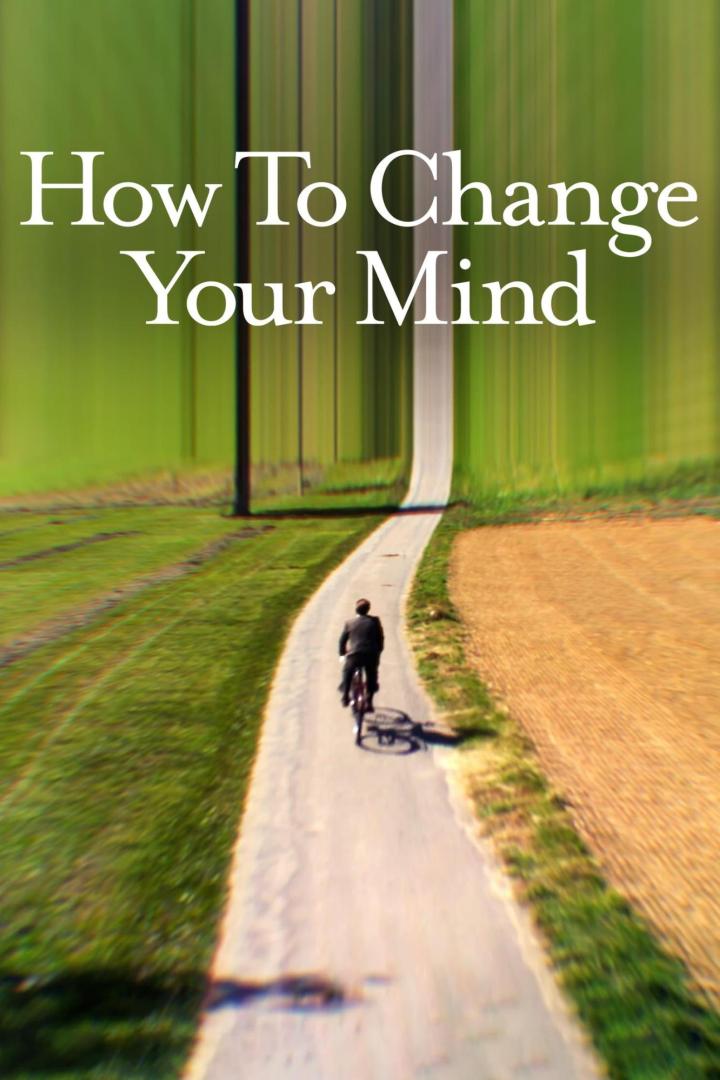 Ein Mann fährt mit dem Fahrrad auf einer Landstraße; im Vordergrund steht der Text „How To Change Your Mind“.