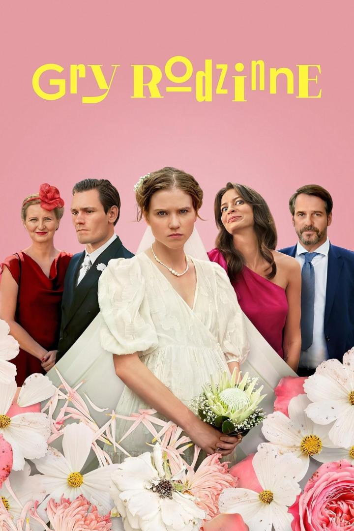 Das Filmplakat für „Gry Rodzinne“ zeigt eine Braut und ihre Familie vor einem rosa Hintergrund.