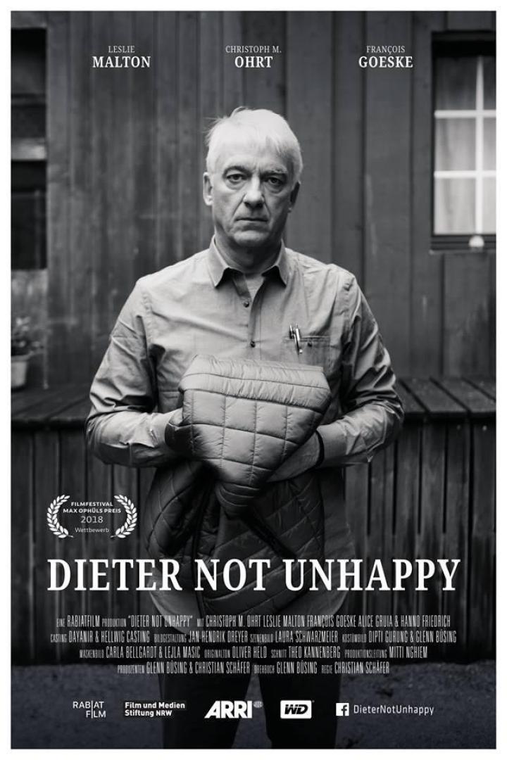Das Filmplakat zu „Dieter Not Unhappy“ zeigt Christoph M. Ohrt mit einer Jacke in den Händen.