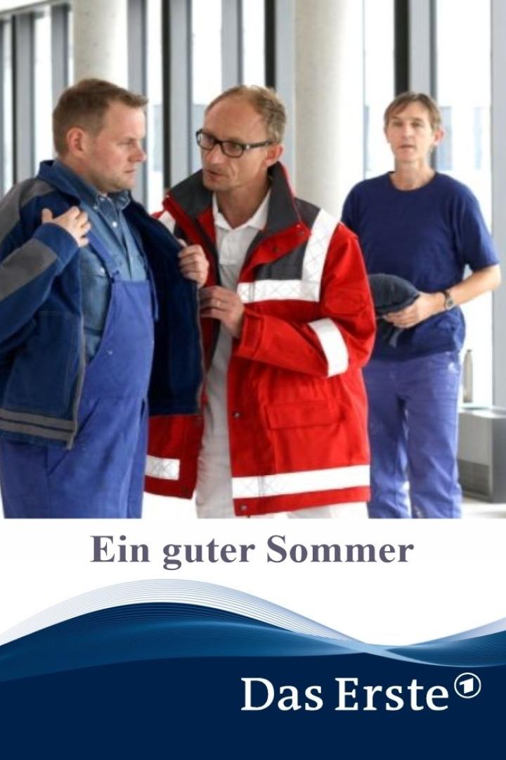 Drei Männer in Arbeitskleidung stehen in einem Gebäude.