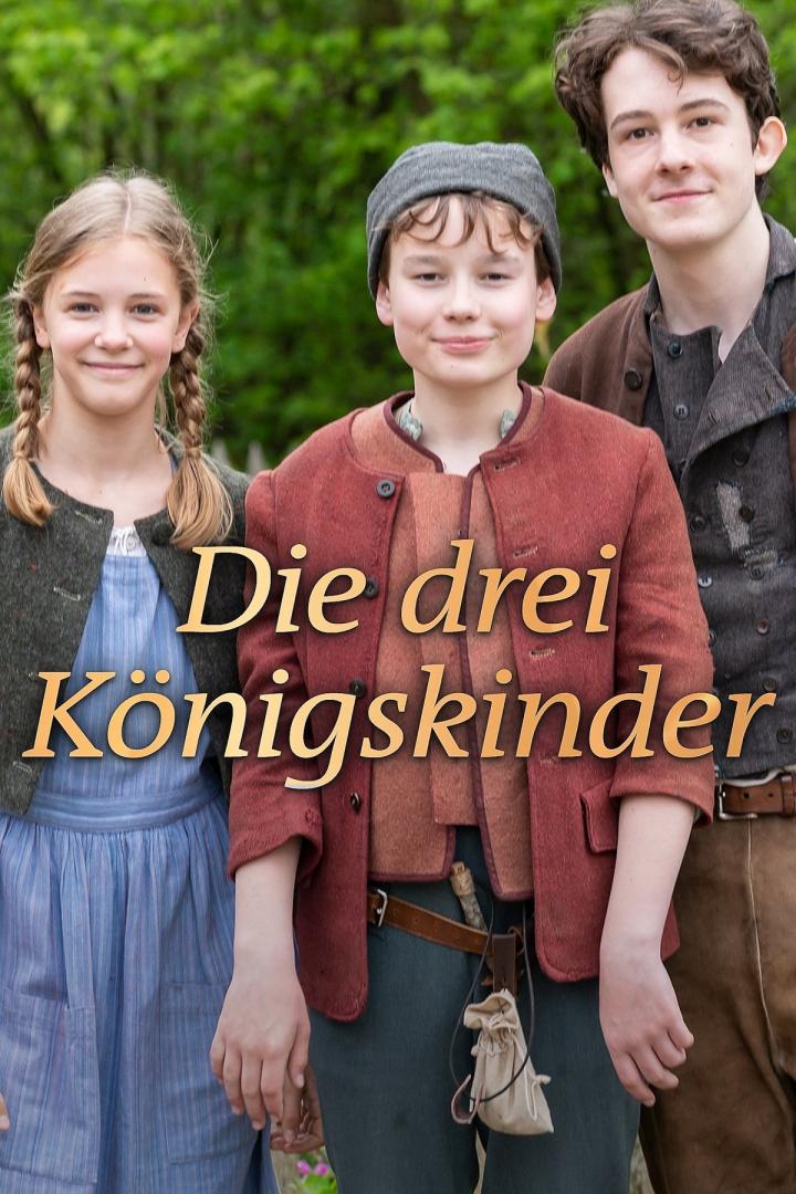 Drei junge Schauspieler in Kostümen für den Film „Die drei Königskinder“.