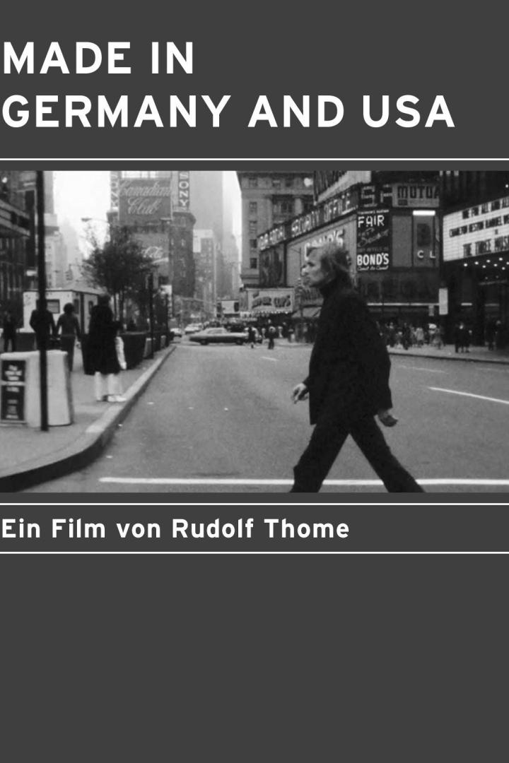 Rudolf Thome überquert eine Straße in New York, im Hintergrund Kinoplakate.