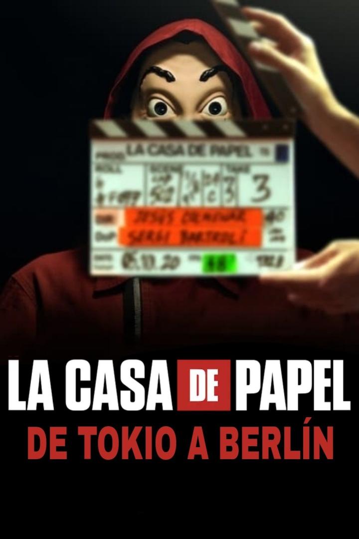 Ein verhülltes Gesicht hinter einer Filmklappe für „La Casa de Papel: De Tokio a Berlín“.