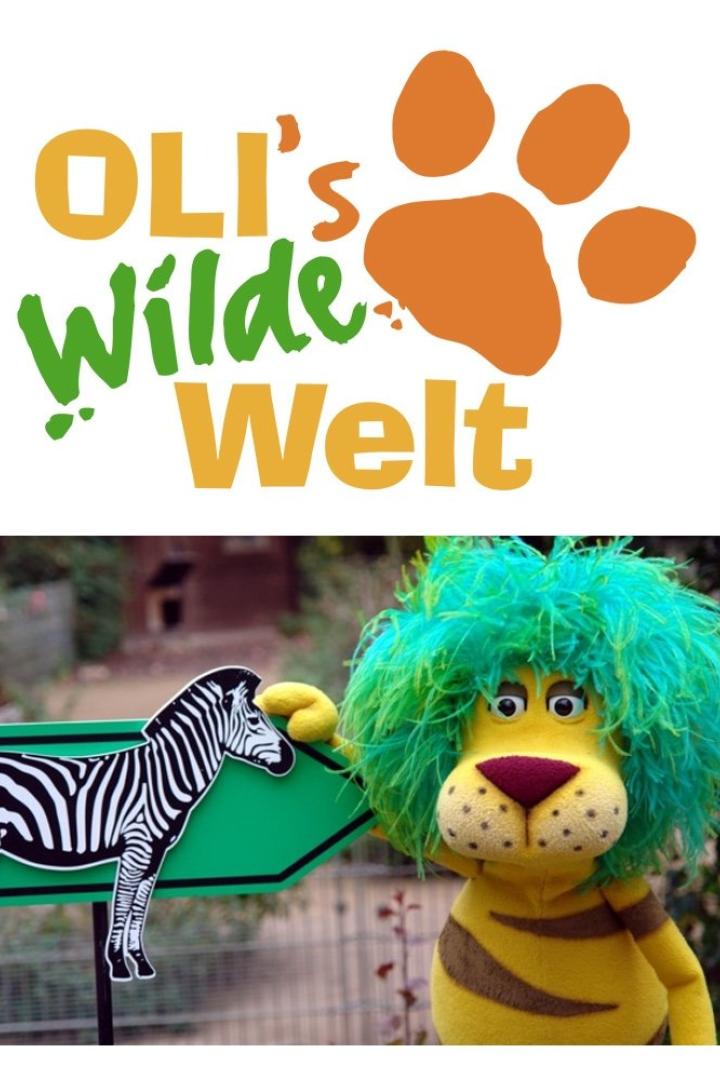 Ein gelbes Löwen-Stofftier mit grüner Mähne steht neben einem Schild mit einem Zebra.