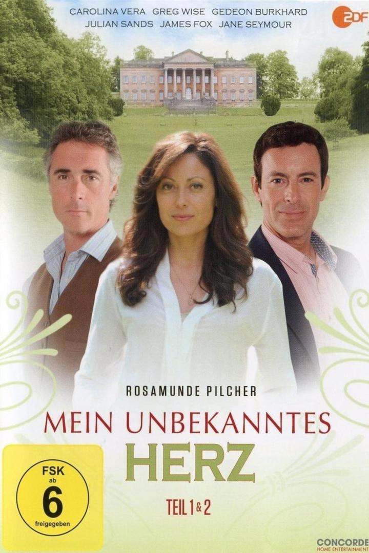 Das Cover von Rosamunde Pilchers „Mein unbekanntes Herz“ mit den Schauspielern und einem Herrenhaus im Hintergrund.