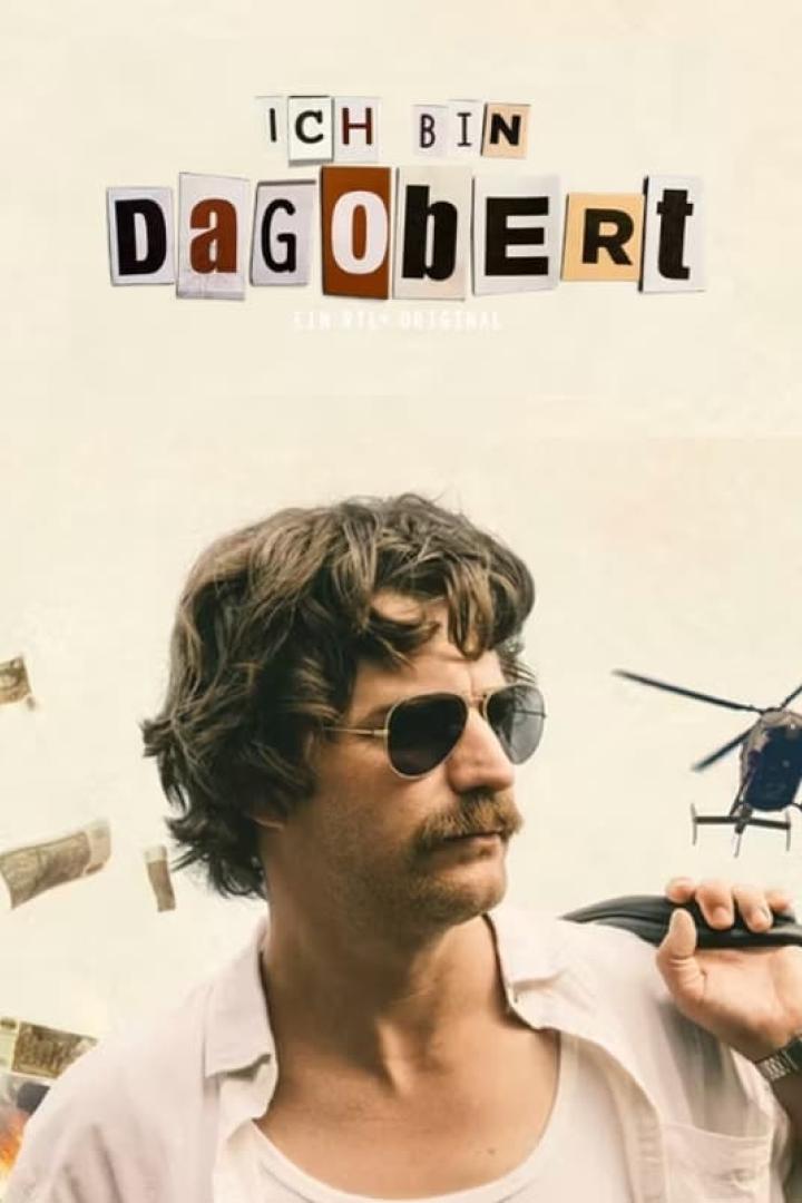 Ein Mann mit Sonnenbrille und Schnurrbart vor einem Hubschrauber, im Hintergrund der Titel „Ich bin Dagobert“.