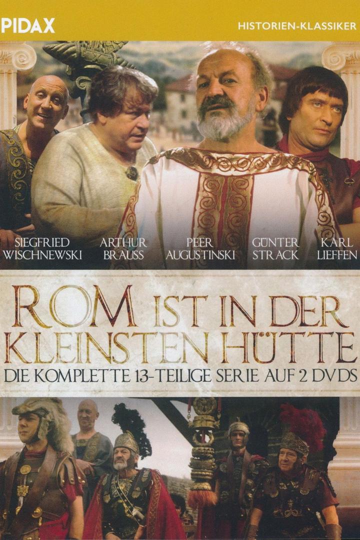 Das DVD-Cover der 13-teiligen Serie „Rom ist in der kleinsten Hütte“ mit den Schauspielern Siegfried Wischnewski und Arthur Brauss.
