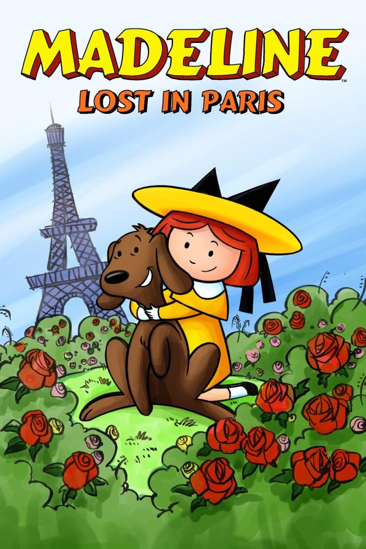 Madeline umarmt einen Hund vor dem Eiffelturm in Paris.