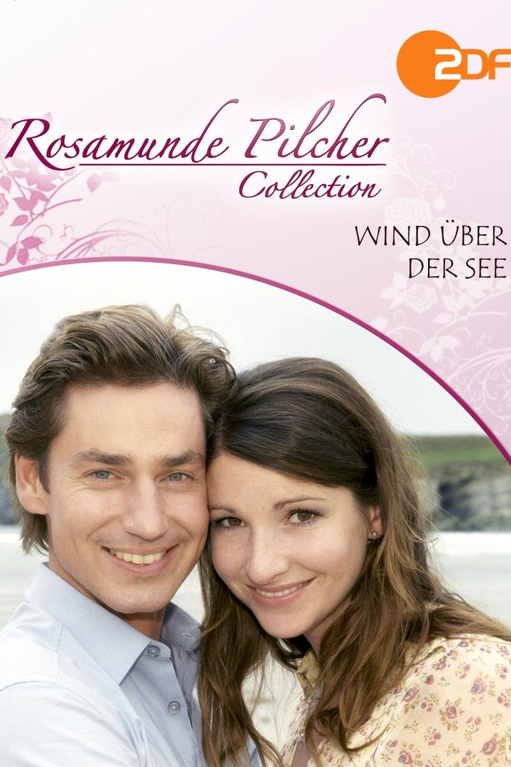 Das Cover der Rosamunde Pilcher Collection: „Wind über der See“ mit einem lächelnden Paar.