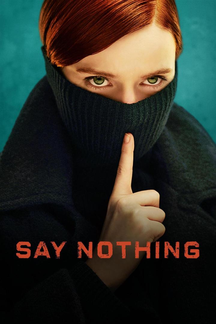 Eine Frau mit rotem Haar hält einen Finger vor den Mund, auf dem Bild steht „Say Nothing“.