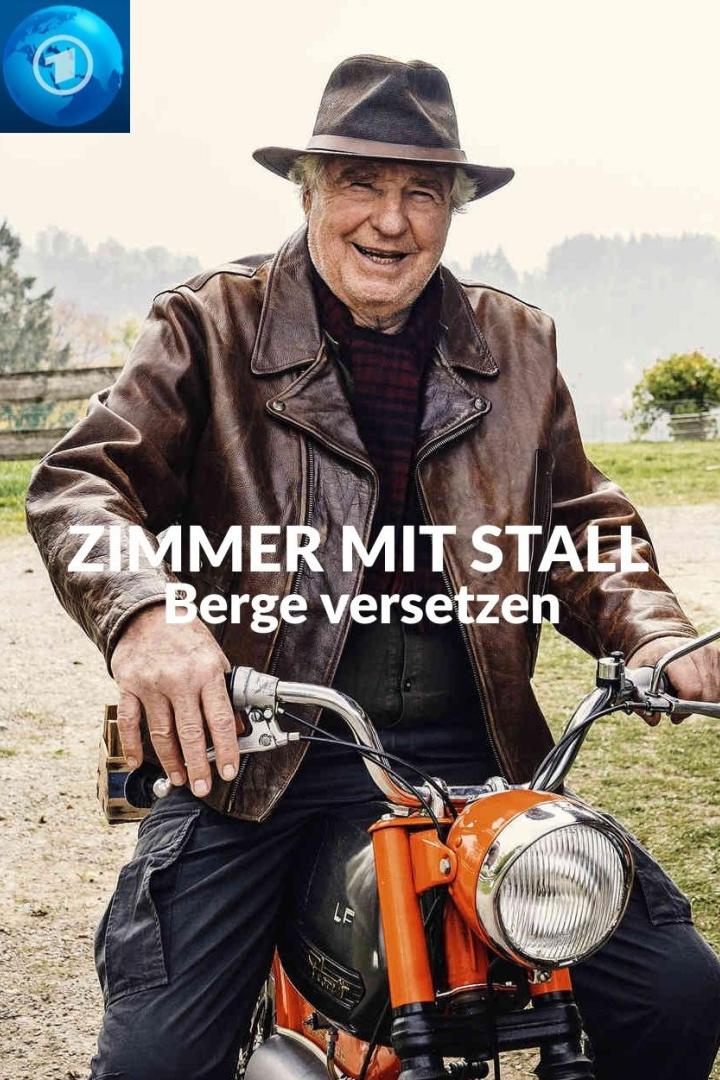 Ein älterer Mann mit Hut und Lederjacke sitzt auf einem orangefarbenen Motorrad.