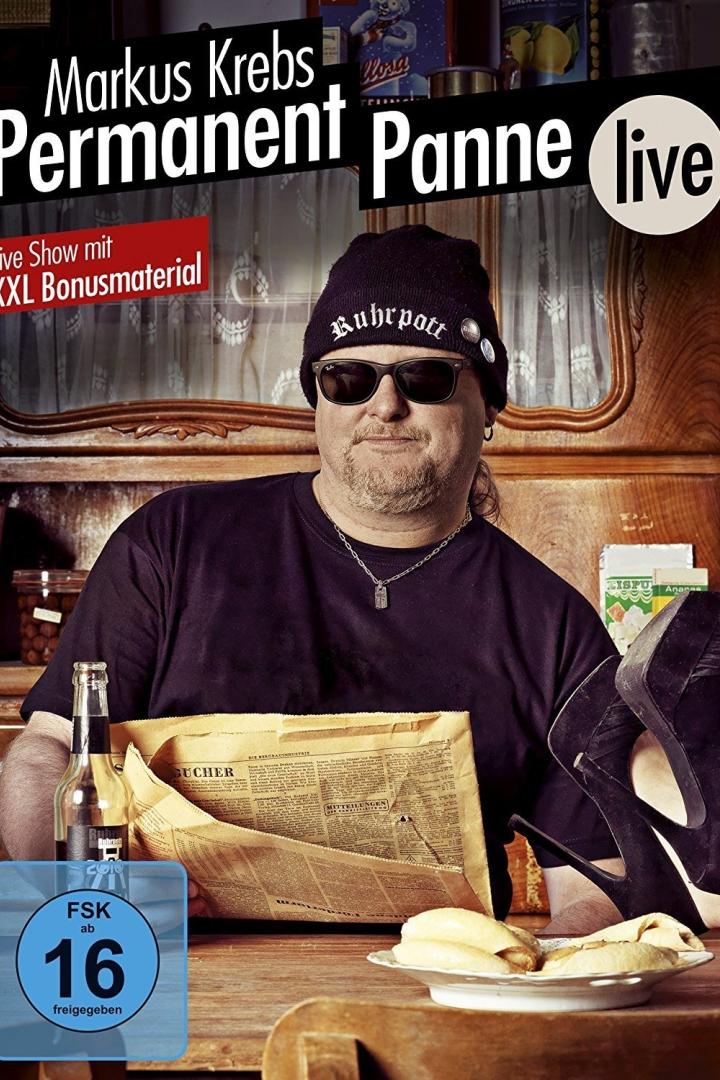 Das Cover der DVD „Markus Krebs – Permanent Panne live“ zeigt den Comedian mit Sonnenbrille und Ruhrpott-Mütze.