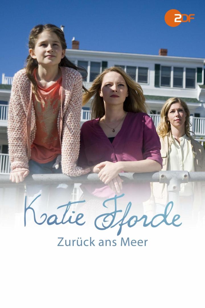 Das Filmplakat zu „Katie Fforde: Zurück ans Meer“ zeigt drei Frauen vor einem Haus am Meer.