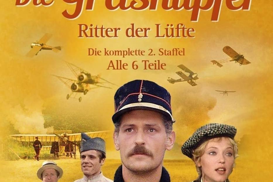 Das Cover der DVD „Die Grashüpfer – Ritter der Lüfte“ mit Bruno Pradal, Jean-Claude Dauphin und Christine Laurent.