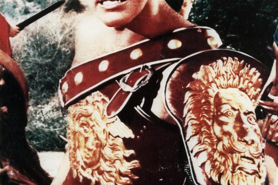 Ein Mann in Gladiatorenrüstung auf dem Filmplakat „Kaiser der Gladiatoren“.