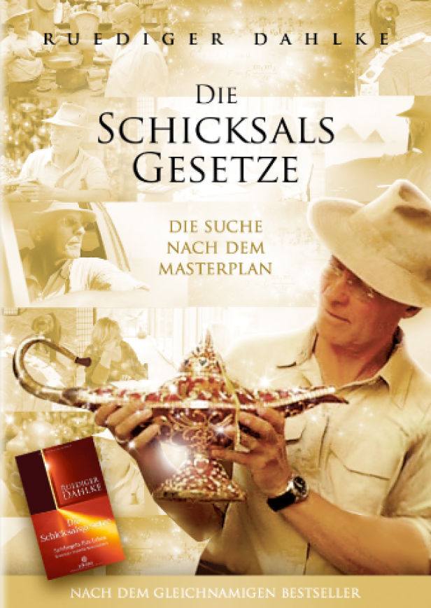 Das Buch „Die Schicksalsgesetze“ von Ruediger Dahlke mit einem Mann, der eine goldene Lampe hält.