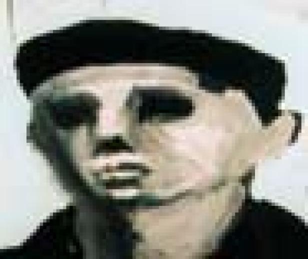 Nahaufnahme eines Mannes mit dunkler Mütze.