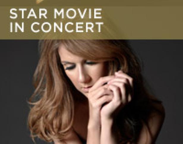 Eine Frau mit langen, braunen Haaren posiert für ein „Star Movie in Concert“.