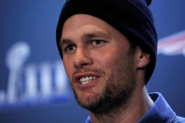 FILE PHOTO: New England Patriots quarterback Tom Brady speaks at a press conference ahead of Super Bowl LIII in Atlanta FILE PHOTO: New England Patriots quarterback Tom Brady speaks at a press conference ahead of Super Bowl LIII in Atlanta