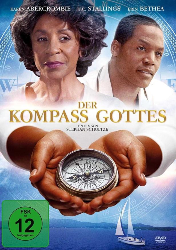 Das Filmplakat für „Der Kompass Gottes“ zeigt Karen Abercrombie und T.C. Stallings mit einem Kompass in den Händen.