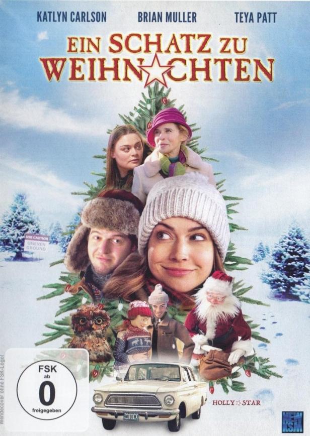 Das Cover des Films „Ein Schatz zu Weihnachten“ zeigt die Hauptdarsteller vor einem Weihnachtsbaum.
