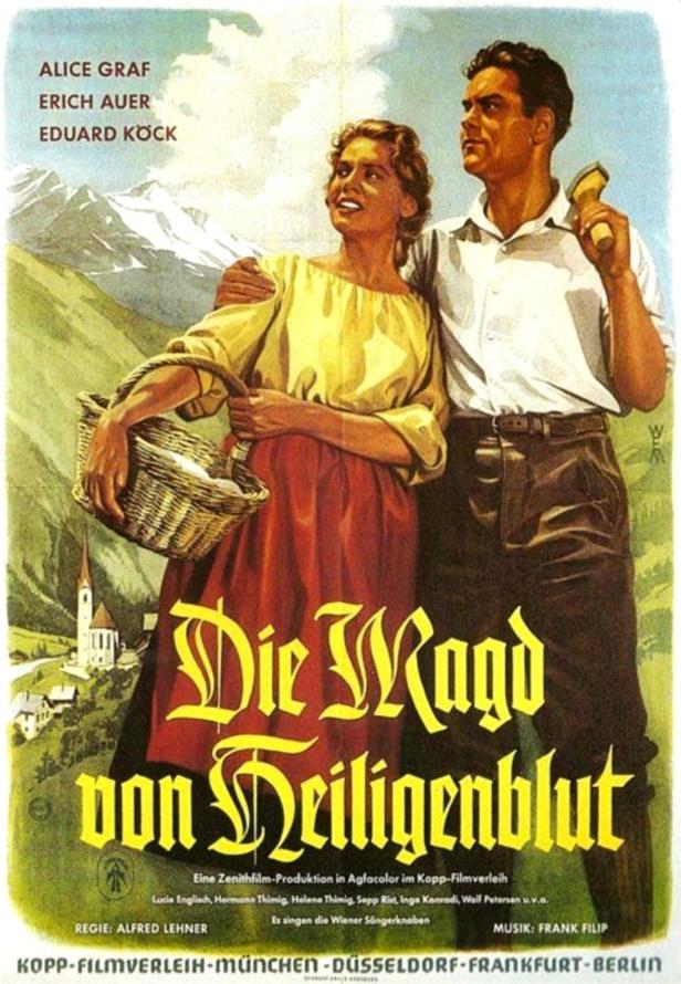 Das Filmplakat für „Die Magd von Heiligenblut“ zeigt Alice Graf und Erich Auer in Tracht vor einer Bergkulisse.